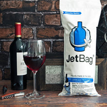 Load image into Gallery viewer, lifestyle image showing a jetbag in use on a bar with a wine bottle and wine glass
